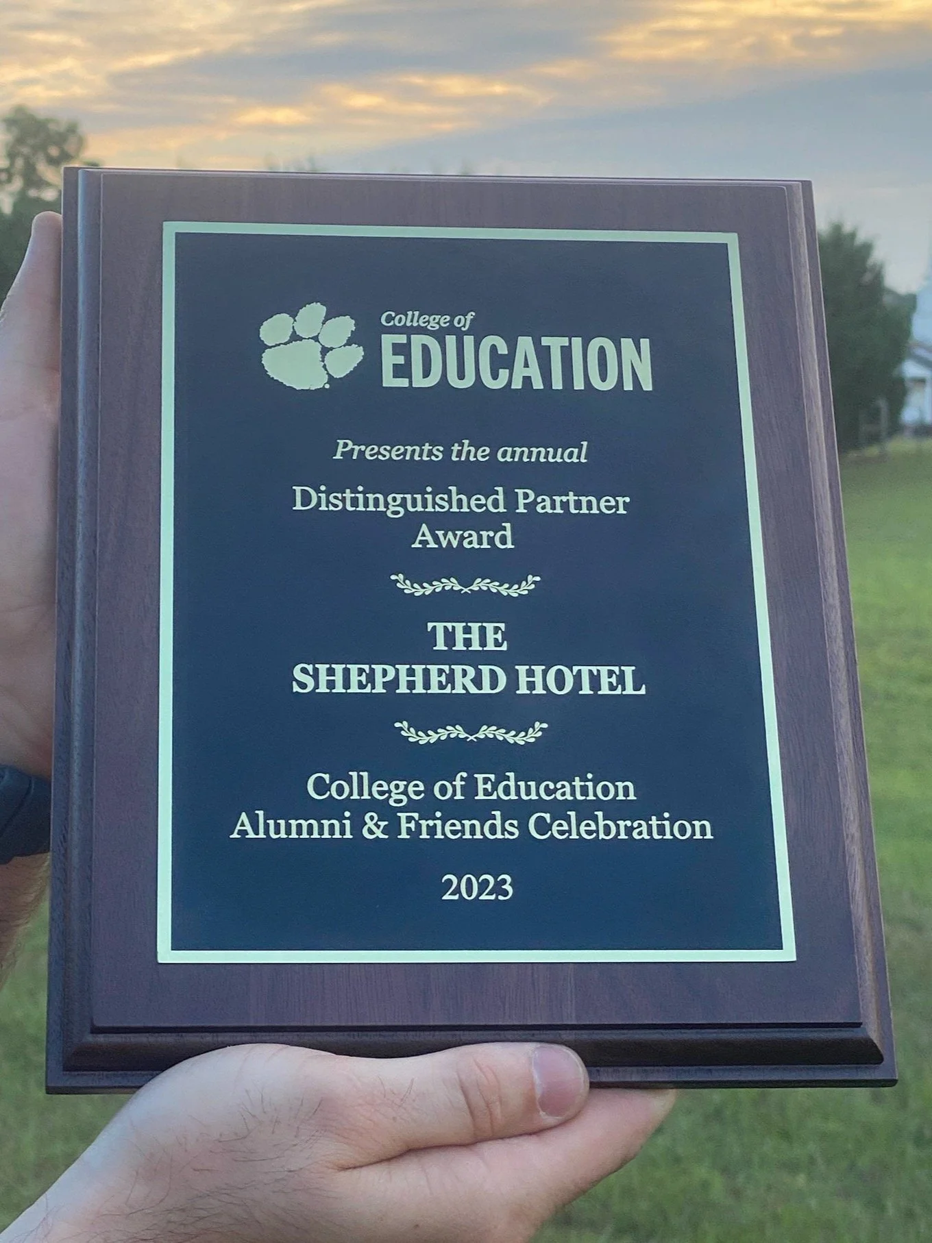 Laser-engraved wood plaque with custom text and logo