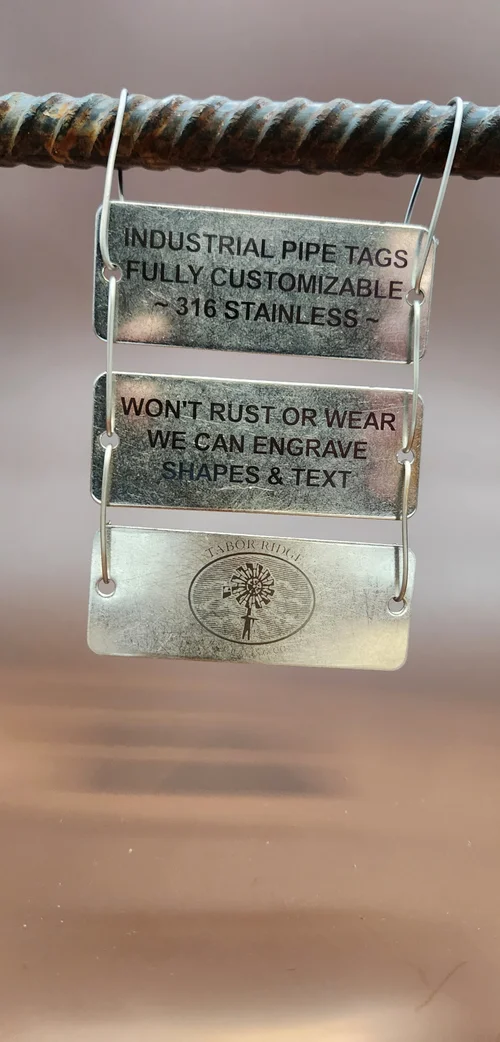 Equipment tags close-up engraving detail