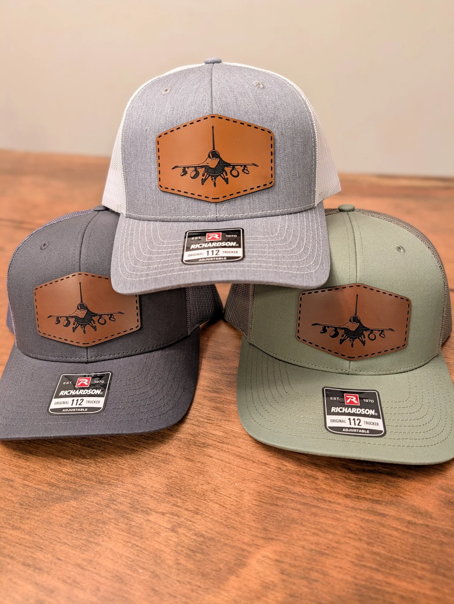 Custom Richardson 112 patch hats with laser-engraved leatherette patches