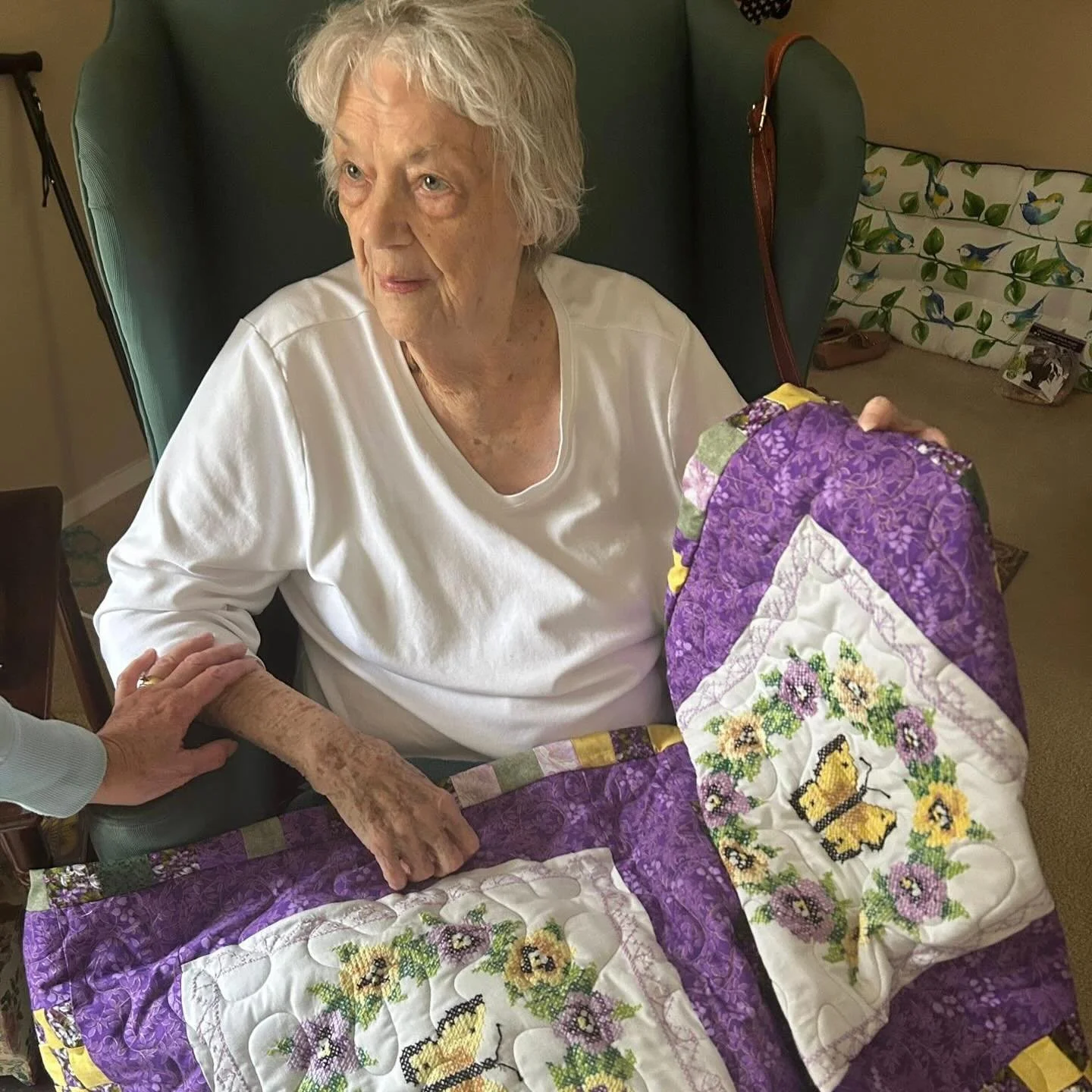 Yesterday was such a special day for Mom (Ruth). For over a year I have kept this Big surprise a secret. Before Mom lost her eyesight to MD she had crossstitched 6 beautiful butterfly panels that she was planning to turn into a quilt.

Mom gave the p
