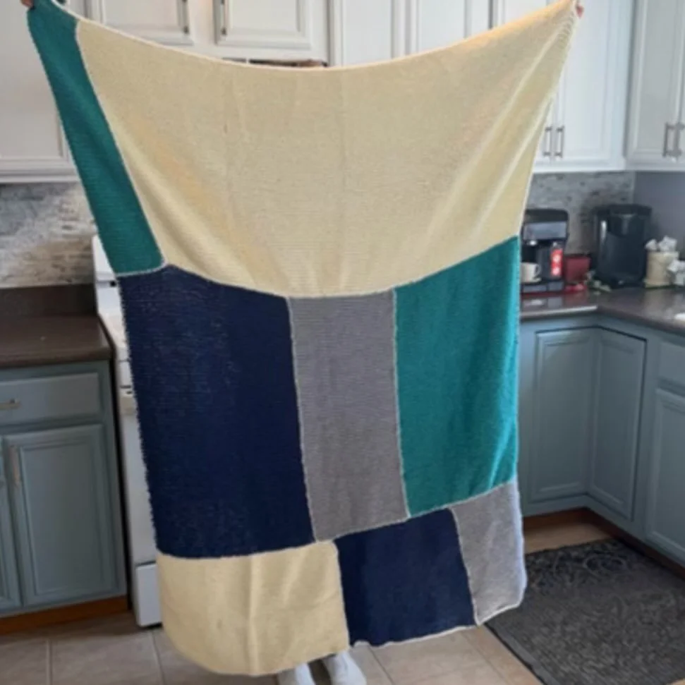 This blanket was begun by June, and submitted by Judy, her daughter.

&ldquo;She seemed to love knitting when I was a child. As she got older, her eyes were not as good as they were earlier in life and she just stopped. It would be so comforting to w