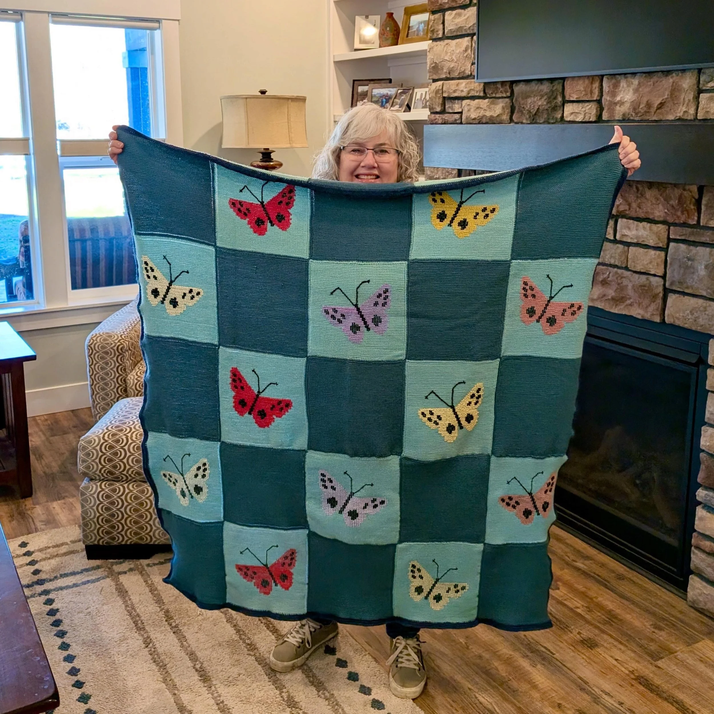 Bonny&rsquo;s mother started this blanket in the 1950s. It traveled to all the places they&rsquo;d lived overseas. The project required both embroidery and crochet skills to complete, and was matched with Lisa, a finisher experienced with both crafts