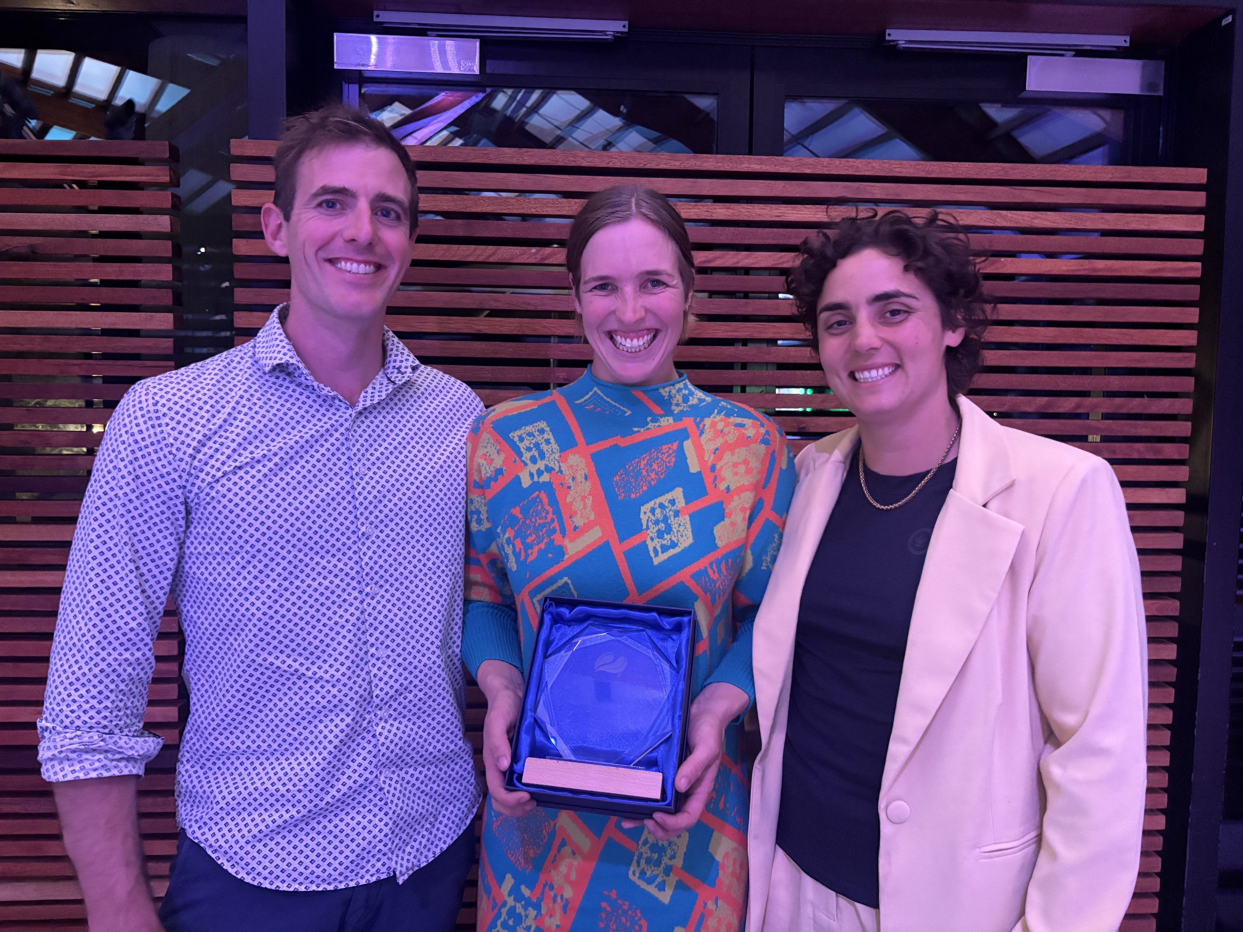 Tyla Bickley (middle), winner of the Diversity and Inclusion Award 2025 with her co-directors James Davies and Maja Blasch
