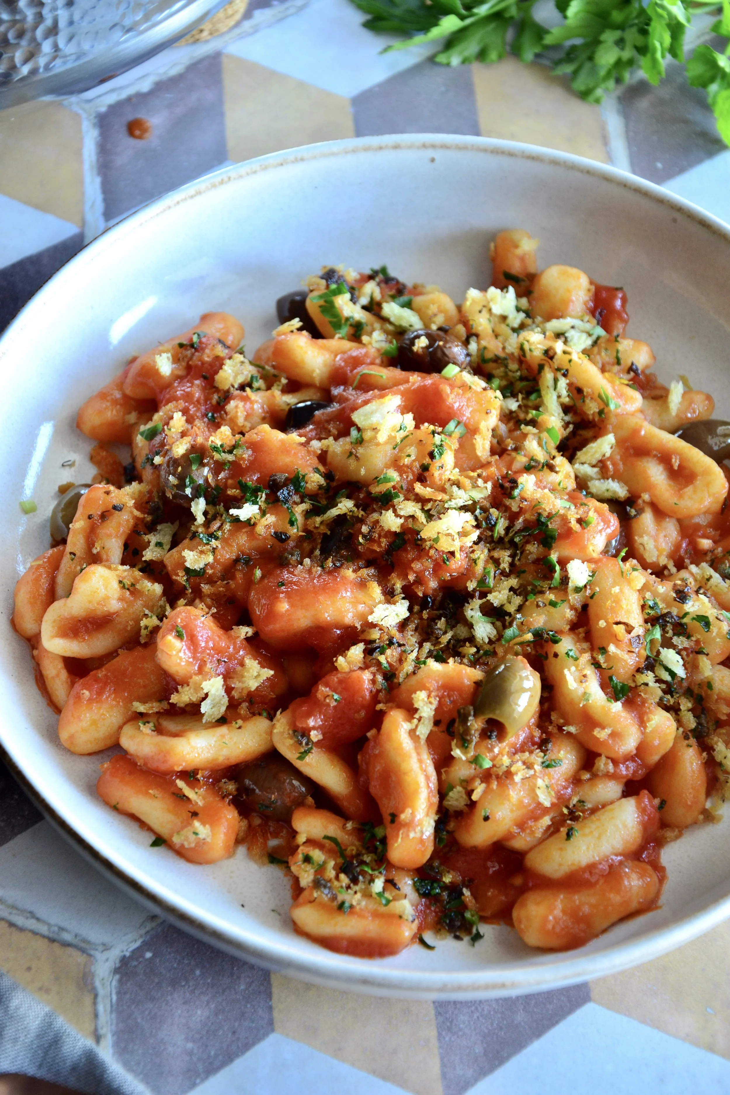 Cavatelli in vegan tomato and olive sauce
