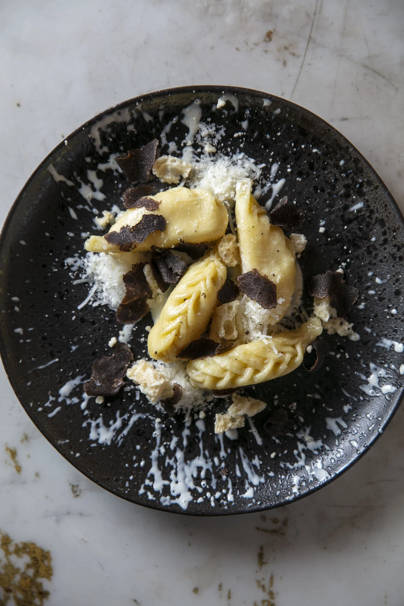 Black truffle Culurgiones with Grana Padano