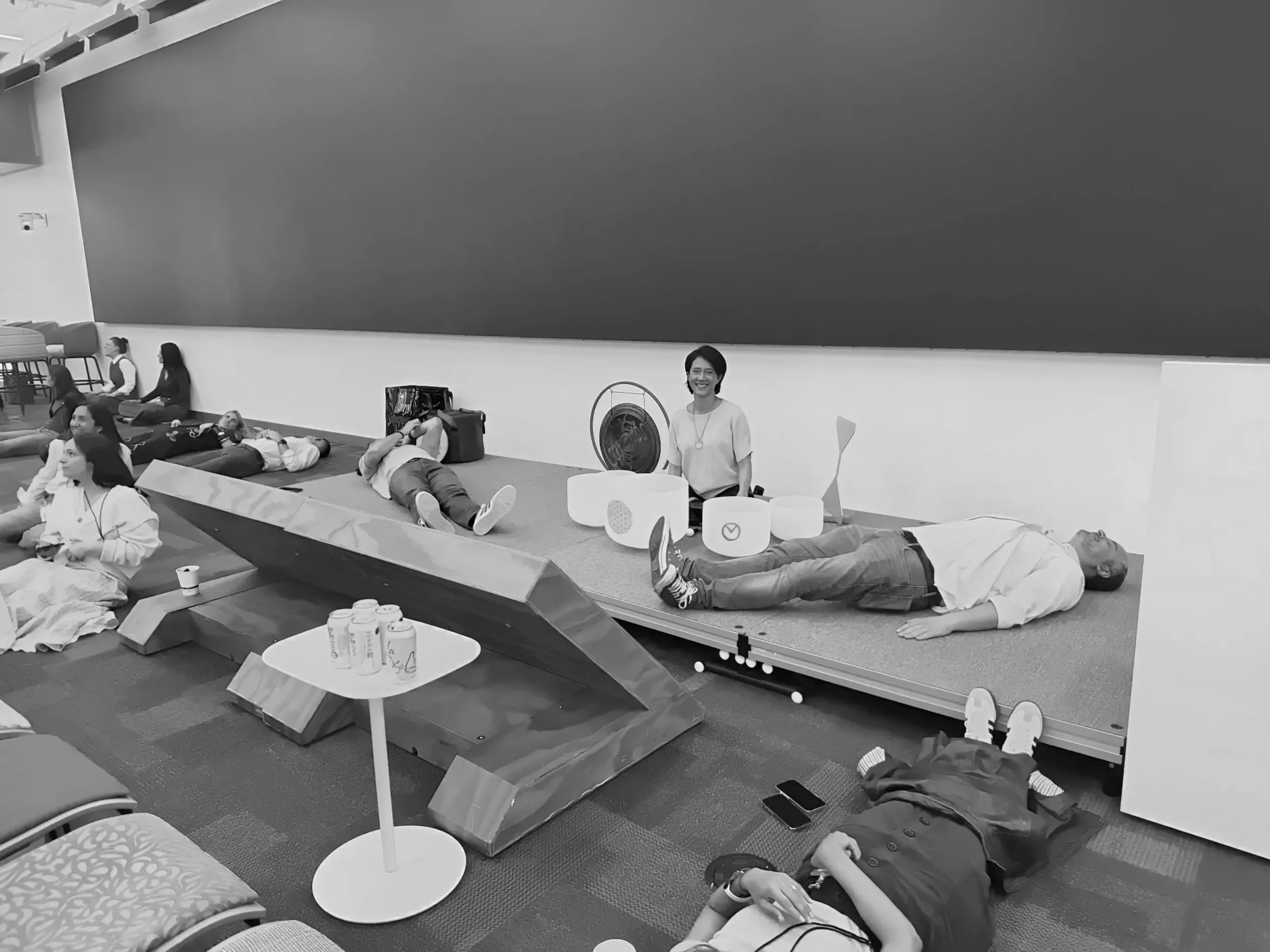 Crystal singing bowls arranged before a corporate sound bath at Meta office — Soundawn NYC