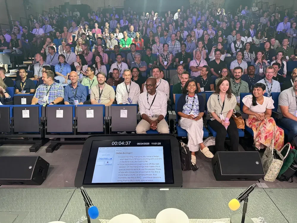 Large corporate audience seated during a Soundawn sound bath session at Google in New York City, led by Natalie Chan as part of a workplace wellness event.