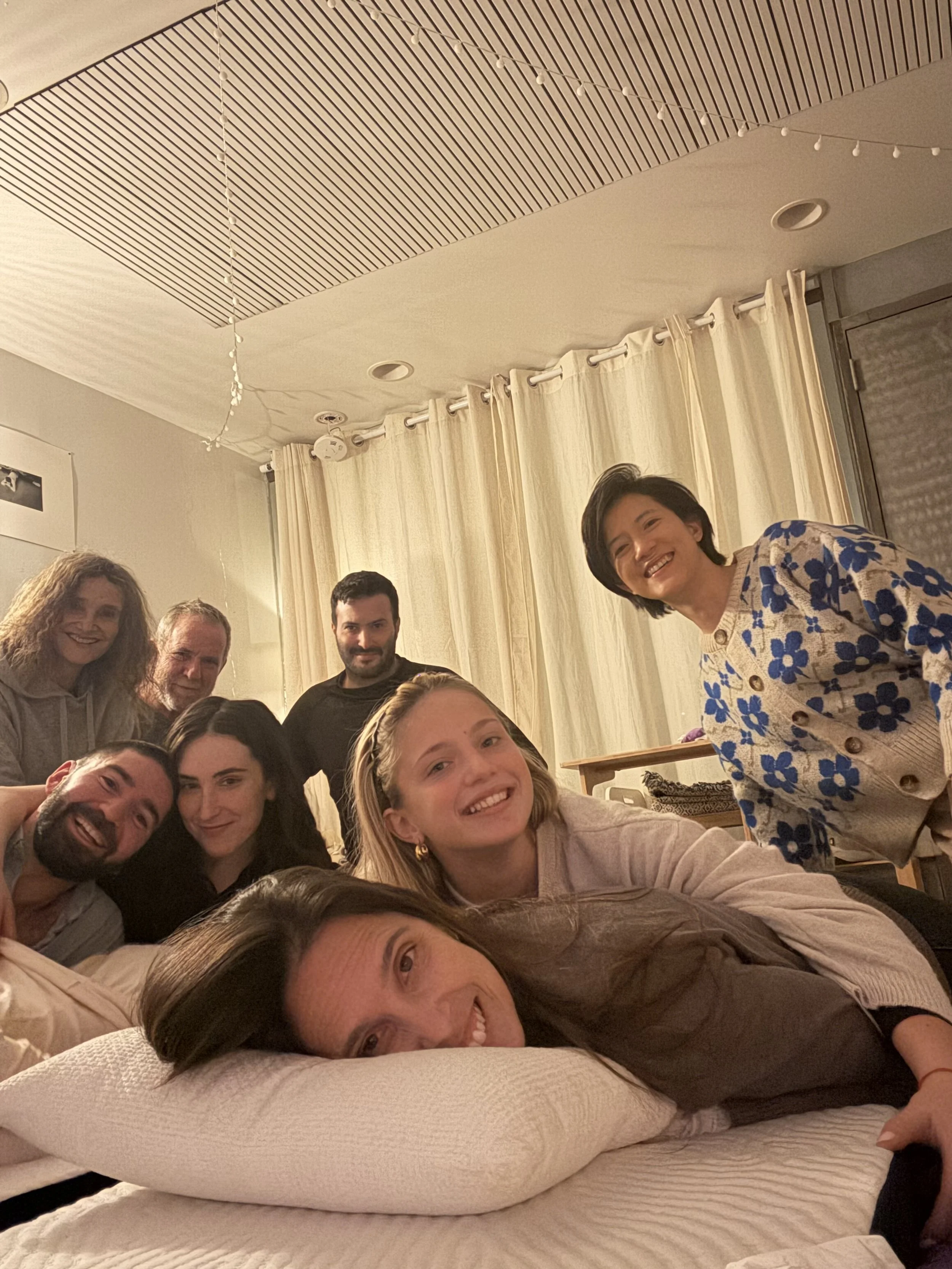 A group of participants celebrating a birthday at Soundawn in Brooklyn with a private birthday sound bath hosted by Natalie Chan