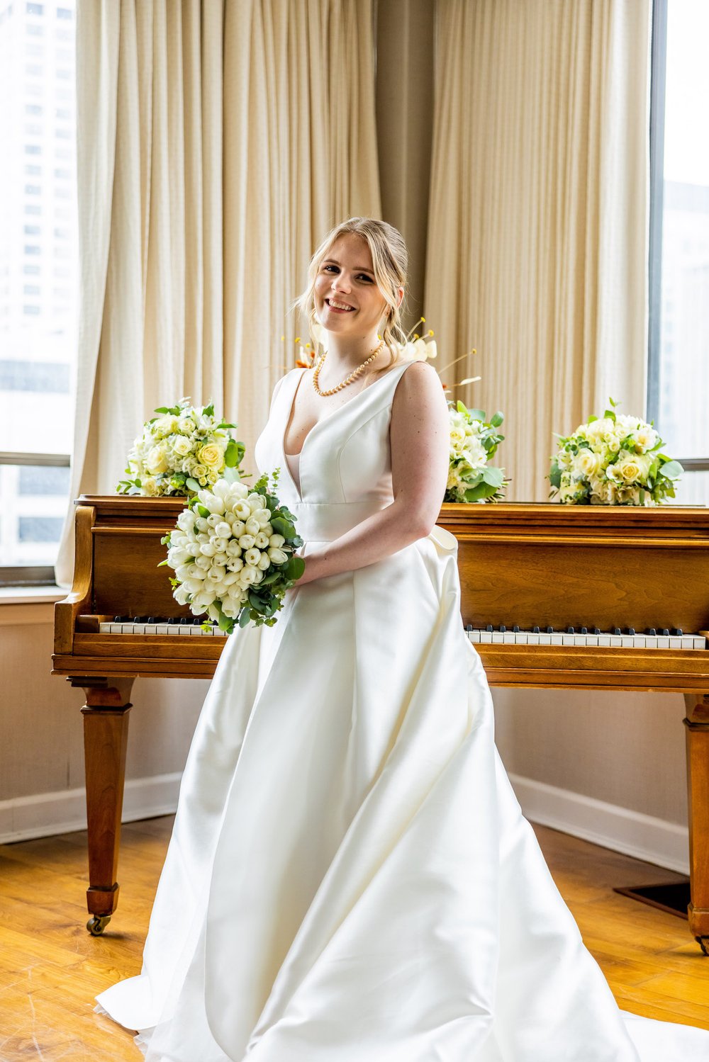  Alex Maldonado Photography | Chicago Wedding and lifestyle Photographer |  selina hotel bridal portraits in suite by piano 