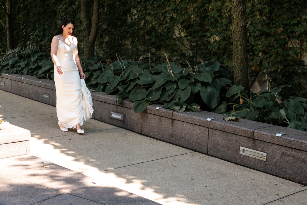 Alex Maldonado Photography | Chicago Wedding Photographer | bride walking along river walk for first look.jpg
