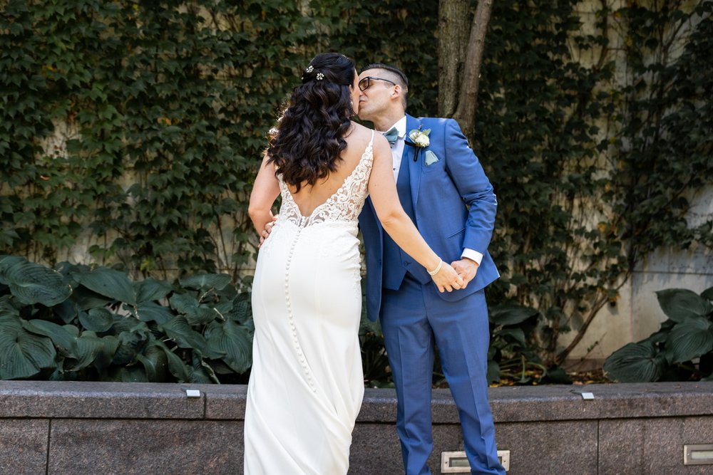 Alex Maldonado Photography | Chicago Wedding Photographer | bride and groom kiss at first look along river walk.jpg