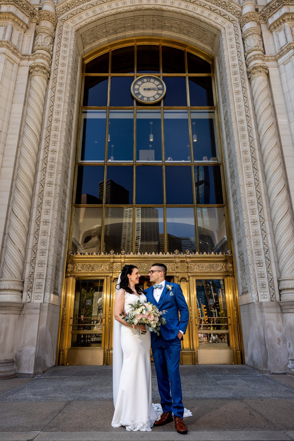 Alex Maldonado Photography | Chicago Wedding Photographer | wedding photos at wrigley building gold trim famous.jpg