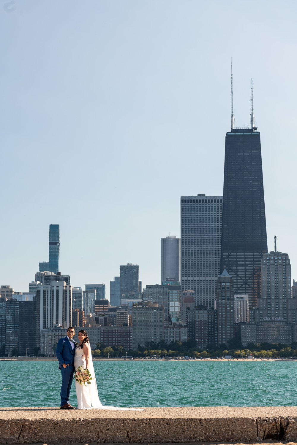 Alex Maldonado Photography | Chicago Wedding Photographer | wedding couple newly wed portraits at north avenue beach with skyline view best.jpg