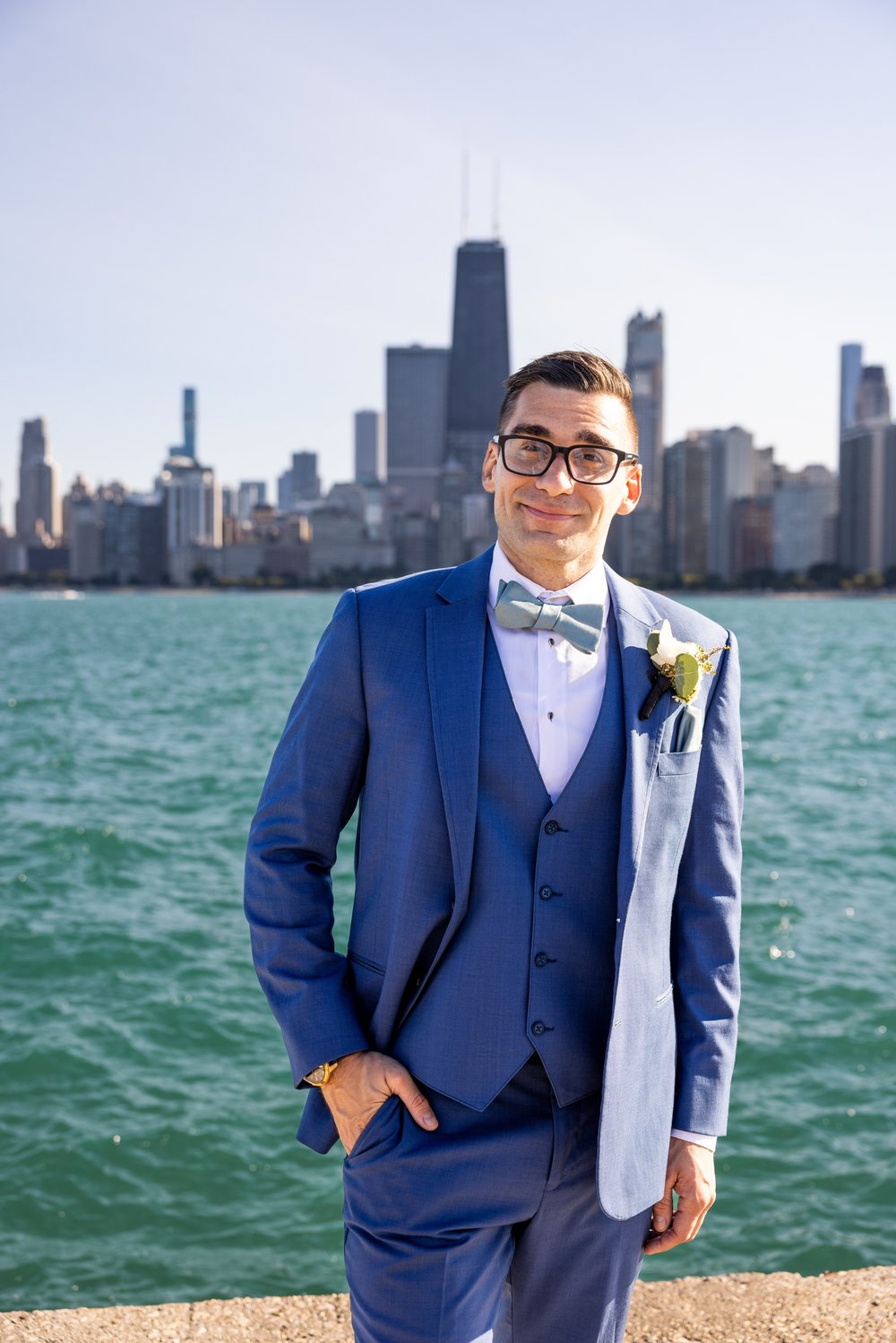 Alex Maldonado Photography | Chicago Wedding Photographer | groom infront of skyline at north avenue beach.jpg