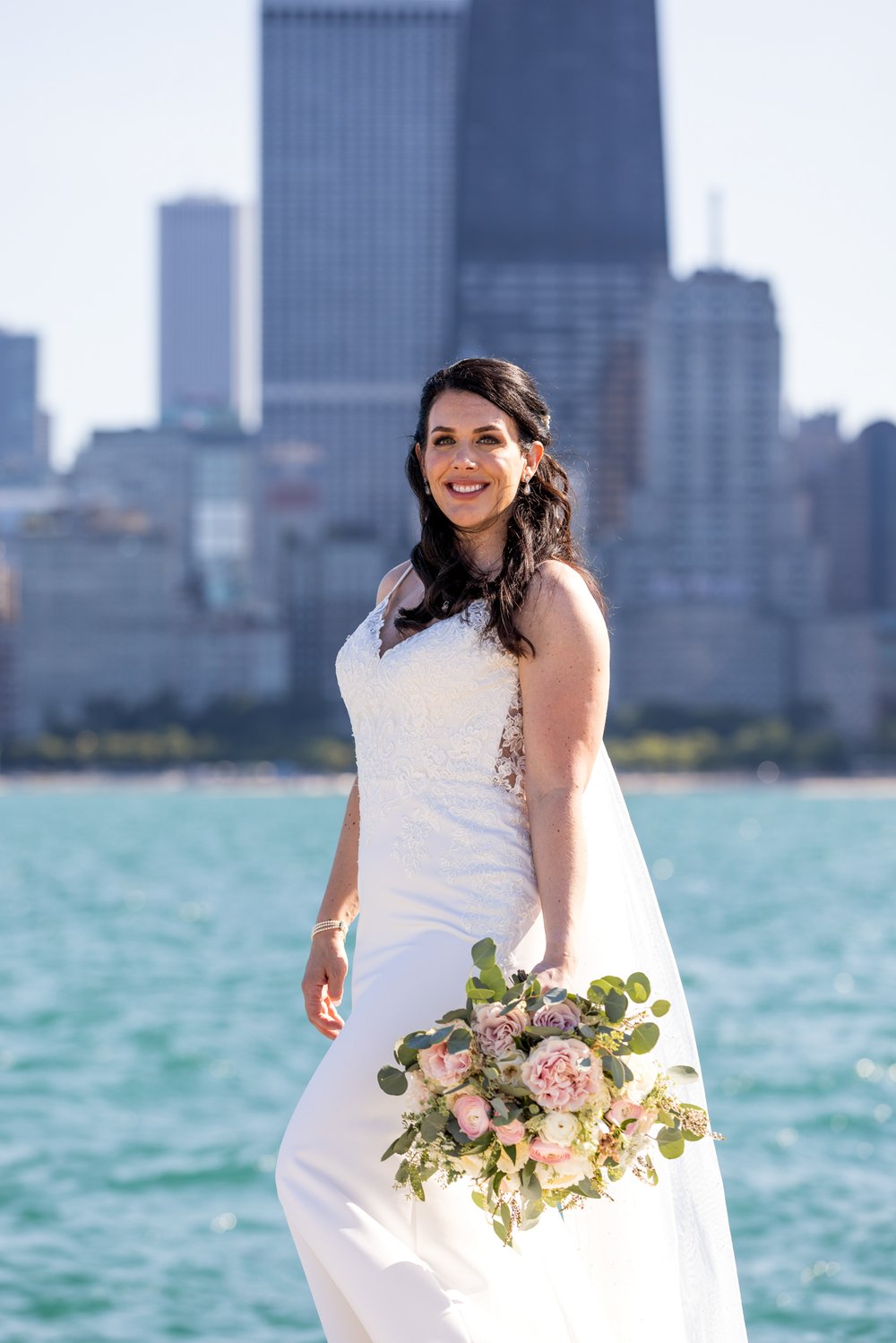 Alex Maldonado Photography | Chicago Wedding Photographer | bride portrait infront of skyline north ave beach.jpg