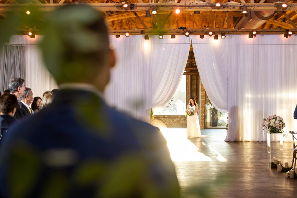 Alex Maldonado Photography | Chicago Wedding Photographer | bride coming down the isle at ceremony space at rockwell on the river.jpg