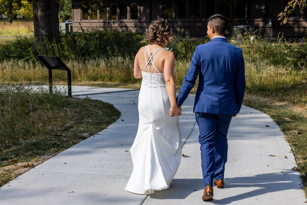 Alex Maldonado Photography | Chicago Wedding Photographer |  Four Rivers Environmental Education Center couple walking along nature trail.jpg