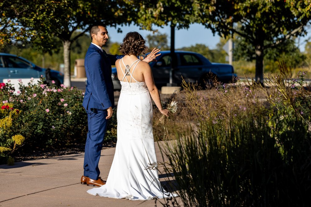 Alex Maldonado Photography | Chicago Wedding Photographer | bride and groom look at rings.jpg