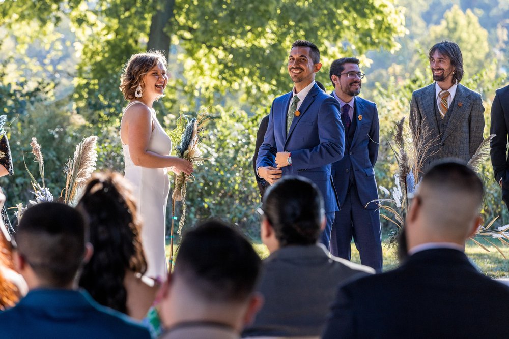 Alex Maldonado Photography | Chicago Wedding Photographer | Four Rivers Environmental Education Center ceremony bride groom laugh.jpg