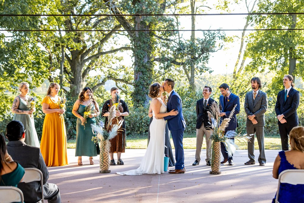 Alex Maldonado Photography | Chicago Wedding Photographer | Four Rivers Environmental Education Center ceremony wide first kiss.jpg