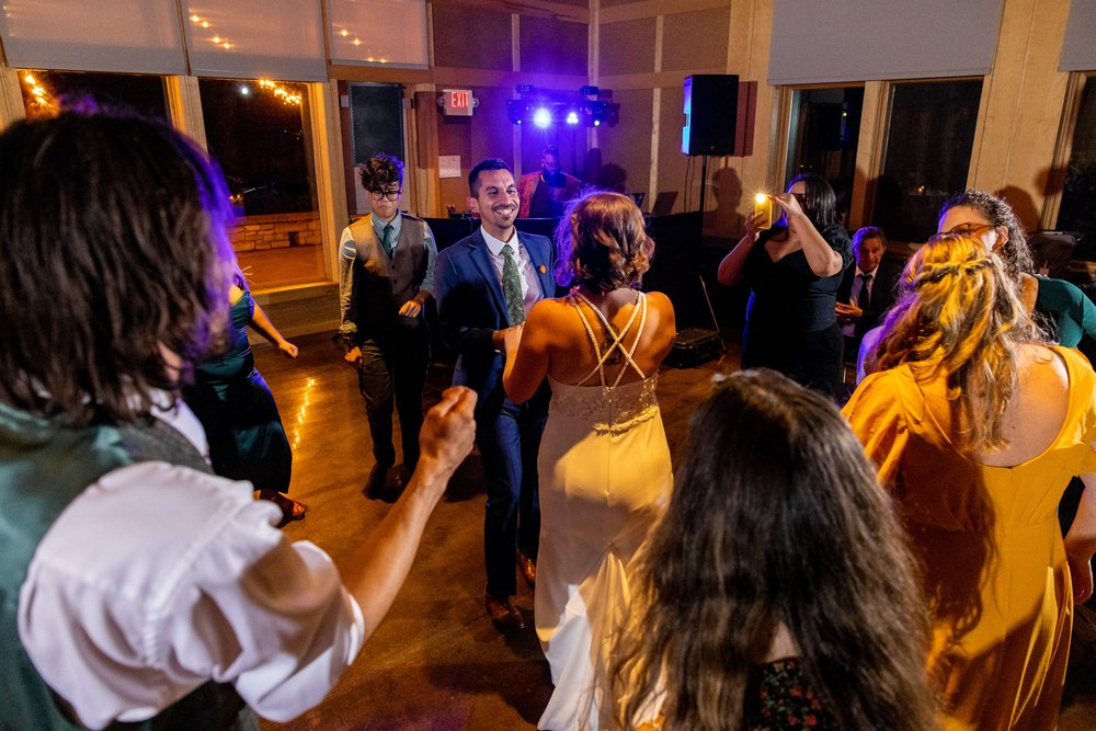 Alex Maldonado Photography | Chicago Wedding Photographer | Four Rivers Environmental Education Center bride and groom dacing reception.jpg
