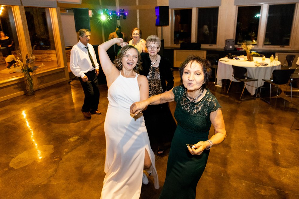 Alex Maldonado Photography | Chicago Wedding Photographer | Four Rivers Environmental Education Center bride with mom dancing.jpg