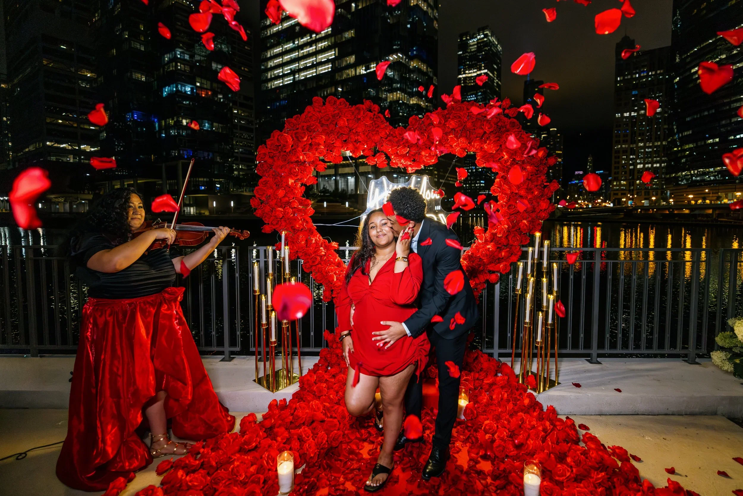 Riverwalk proposal with Heart Decoration and Violinist