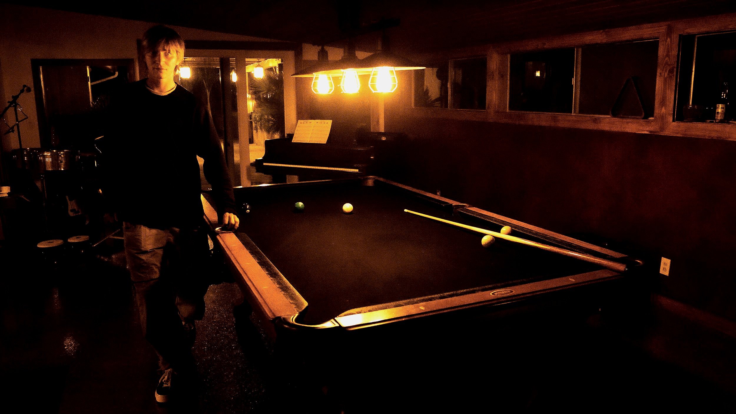 Shot of friends pool table.