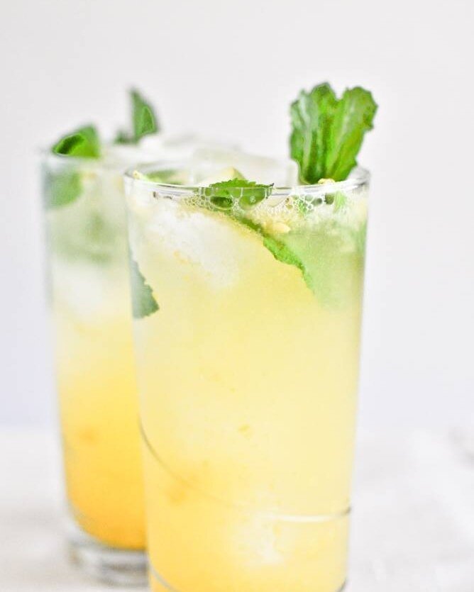 Spicy Pineapple + Rum with a fresh hit of mint. What shall we call this deliciousness?!

1 oz white rum
1 oz spiced rum
1 oz frostbites pineapple habanero cordial
2 oz pineapple juice
1/2 oz lime juice
I like to top with a lime kombucha but plain spa