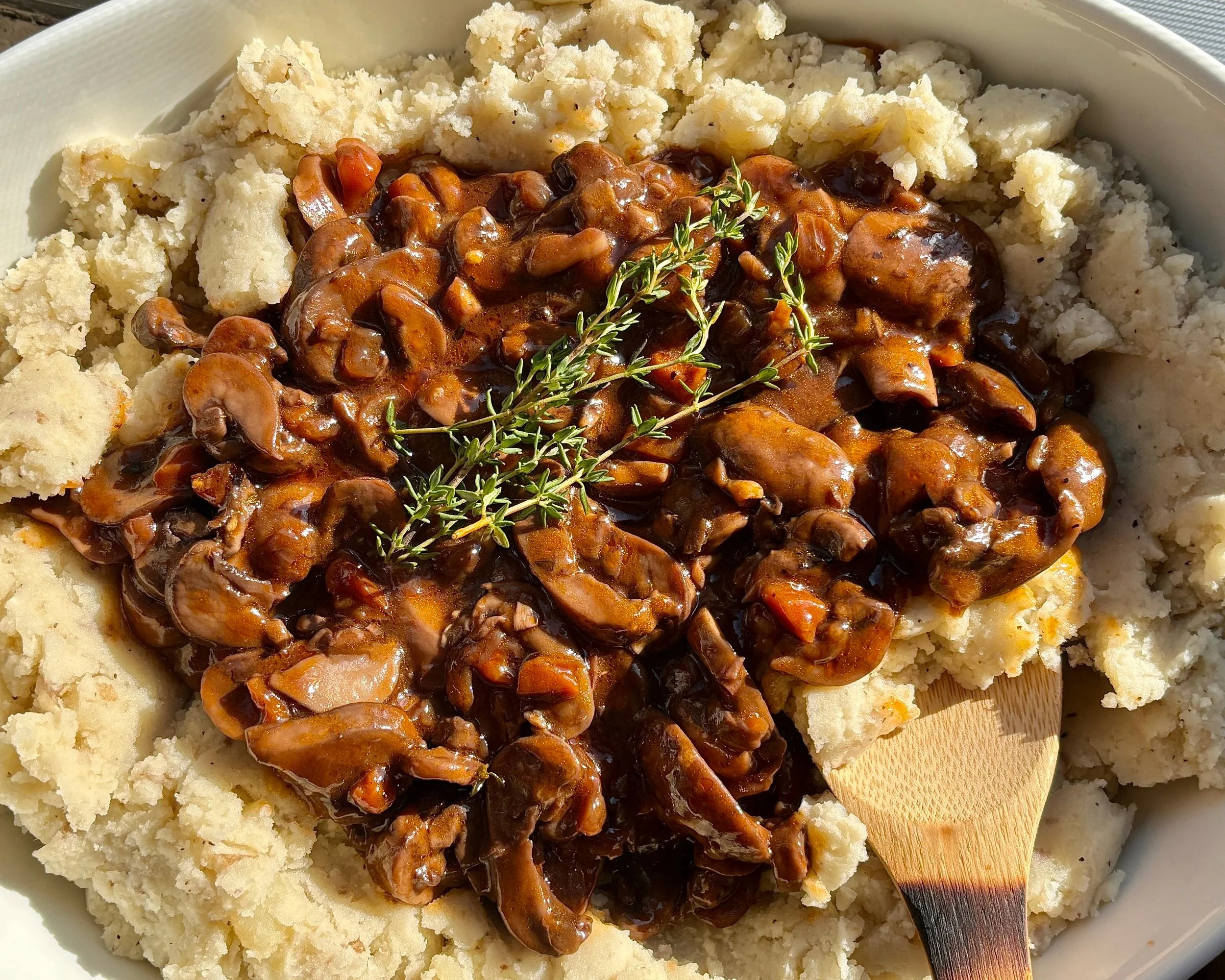vegan and gluten-free mushroom bourguignon with mashed potatoes, mushrooms, carrot, onion, thyme, red wine, and vegetable broth - Plant-Based Pal hearty holiday recipe