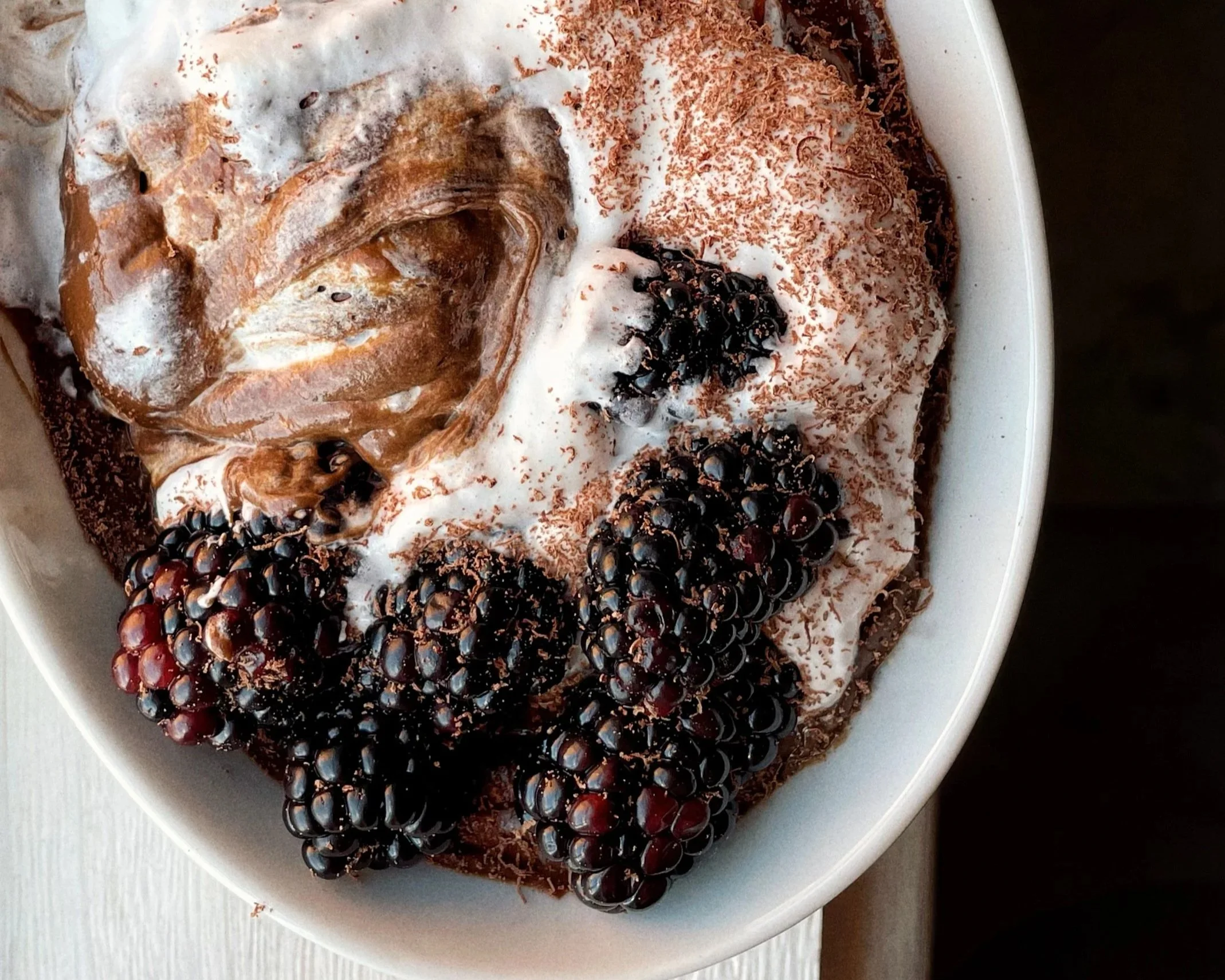 chocolate avocado pudding with blackberries and coconut cream - meatless and wheatless recipe