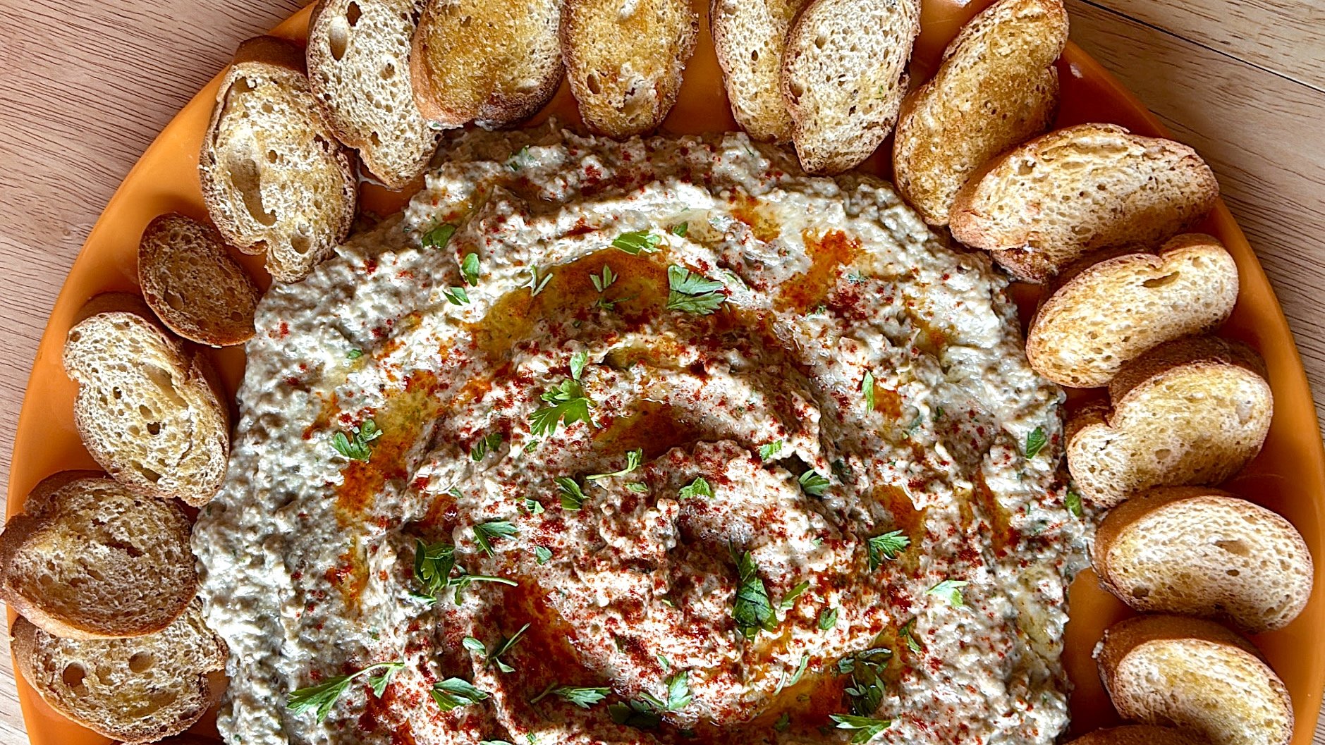 baba ghanoush with olive oil, smoked paprika and parsley