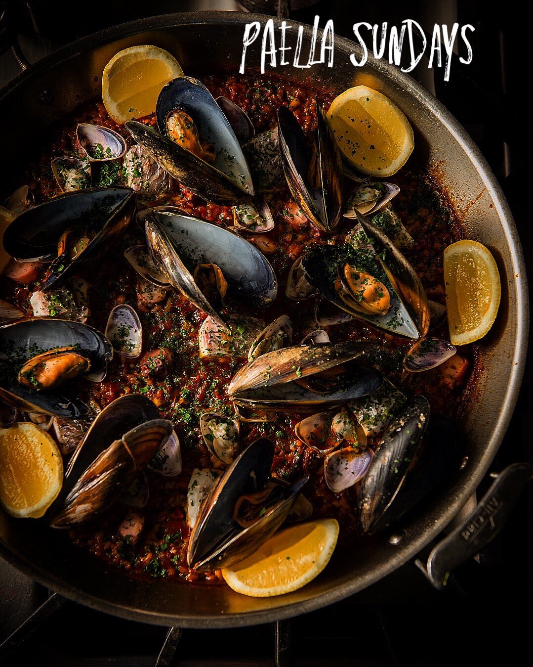 PAELLA DEL DOMINGO.
Starts this Sunday!

Sunday is the culturally designated time for extended Spanish families and friends to gather, socialize, and cook massive pans of paella together. 

Always Lunch, Not Dinner&mdash;Paella is strictly a midday m