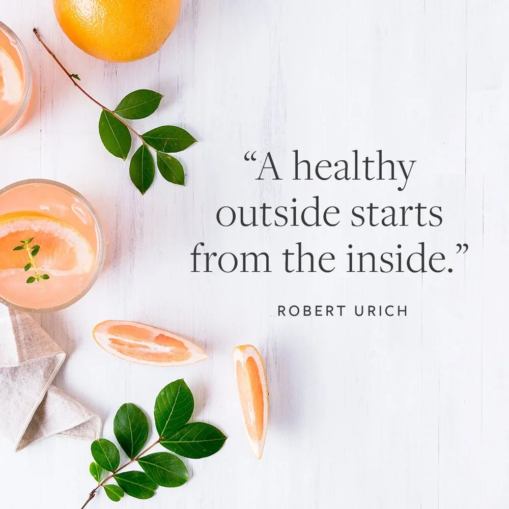 Quote by Robert Urich on white background with citrus and grapefruit juice