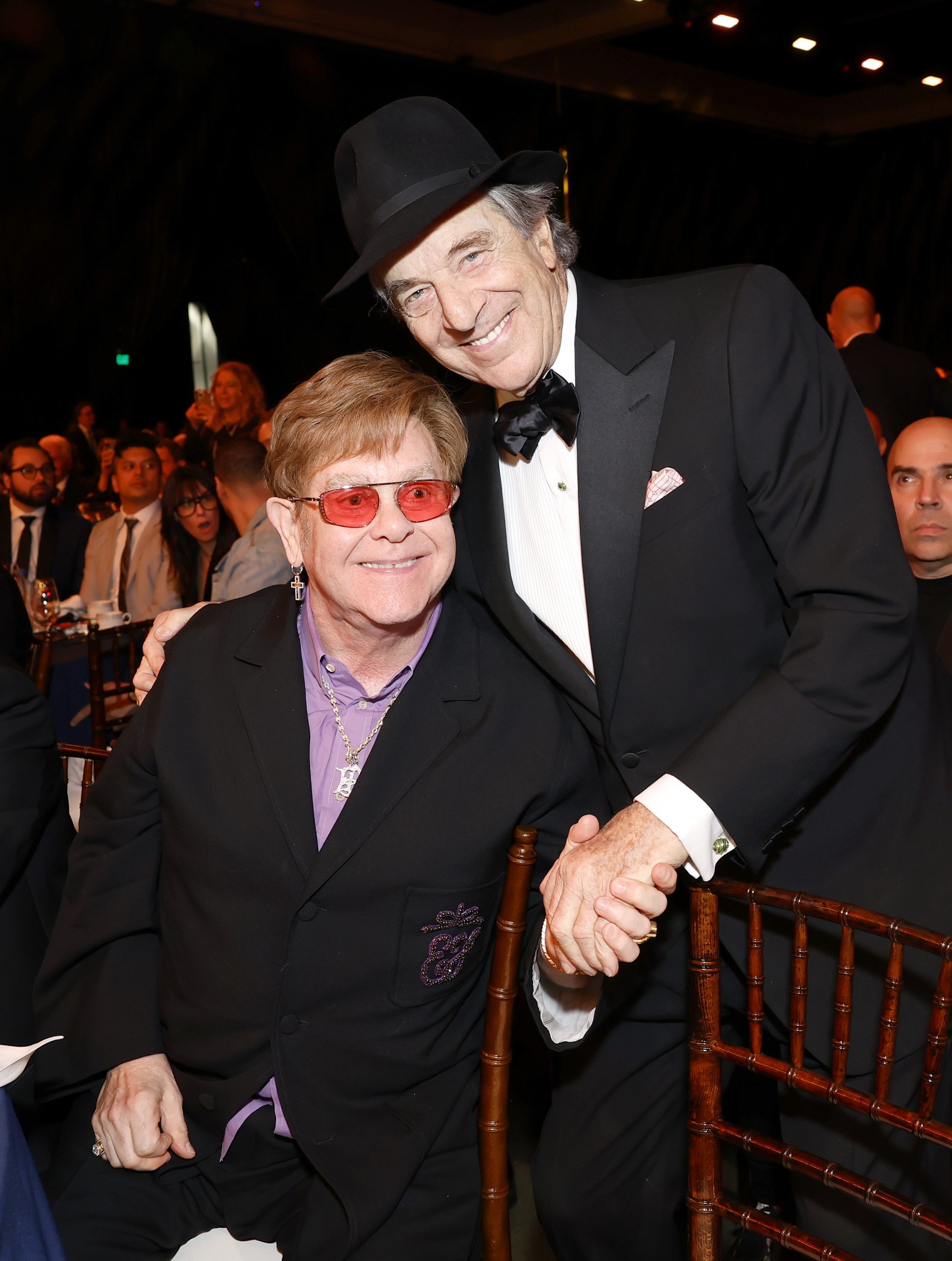  LOS ANGELES, CALIFORNIA - FEBRUARY 03: (L-R) Elton John and Paul Pelosi attend MusiCares Persons of the Year Honoring Berry Gordy and Smokey Robinson at Los Angeles Convention Center on February 03, 2023 in Los Angeles, California. (Photo by Emma Mc