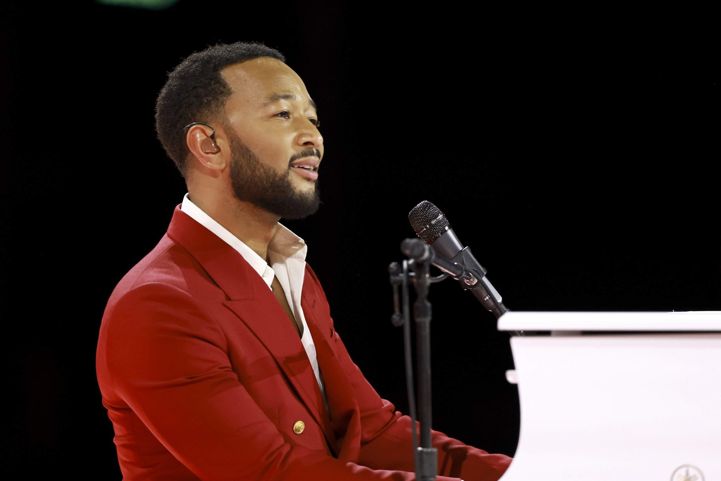  LOS ANGELES, CALIFORNIA - FEBRUARY 03: John Legend performs onstage during MusiCares Persons of the Year Honoring Berry Gordy and Smokey Robinson at Los Angeles Convention Center on February 03, 2023 in Los Angeles, California. (Photo by Matt Winkel