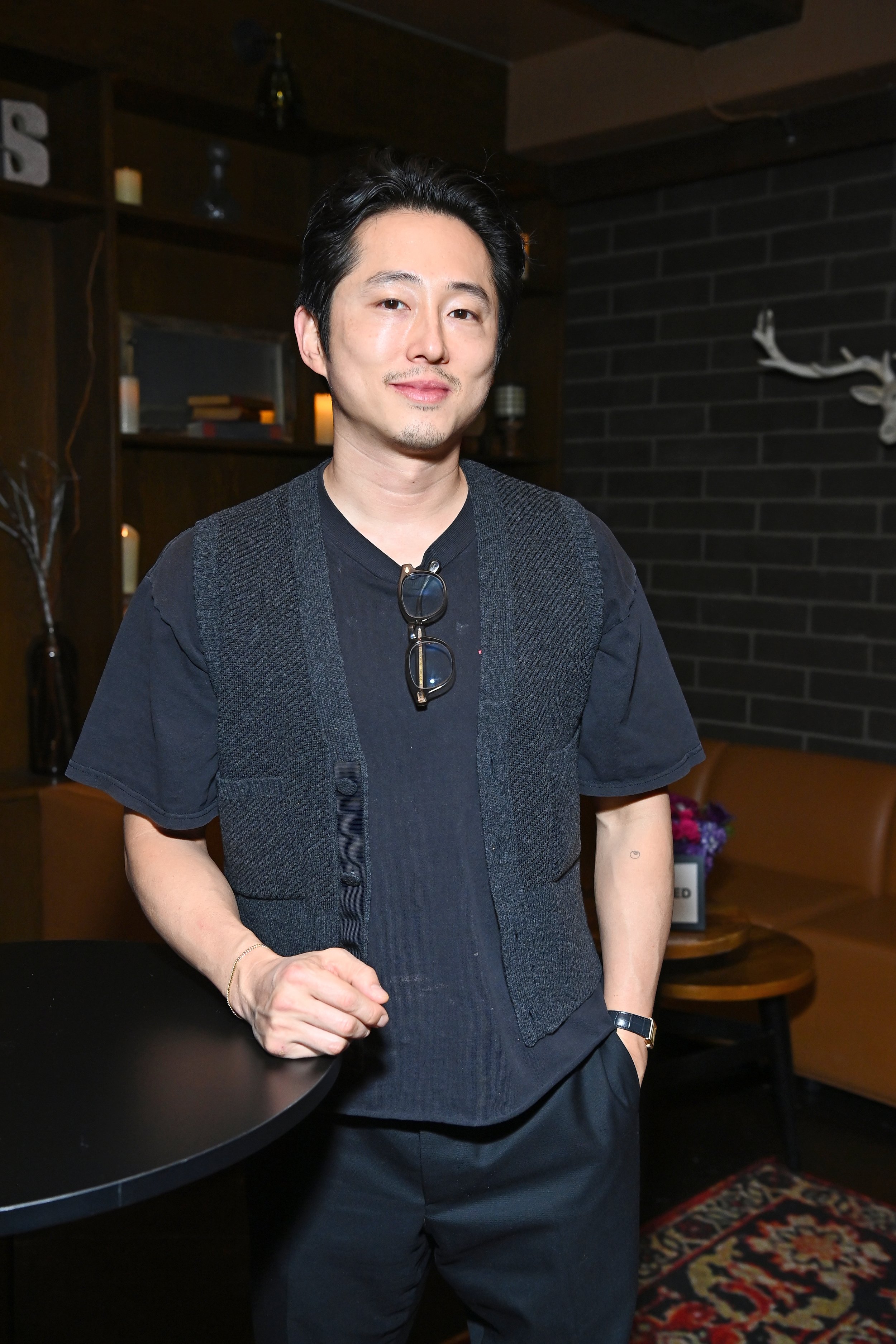 Steven Yeun attends the Love Me Premiere Party at Fletcher's hosted by Ketel One Vodka.jpg