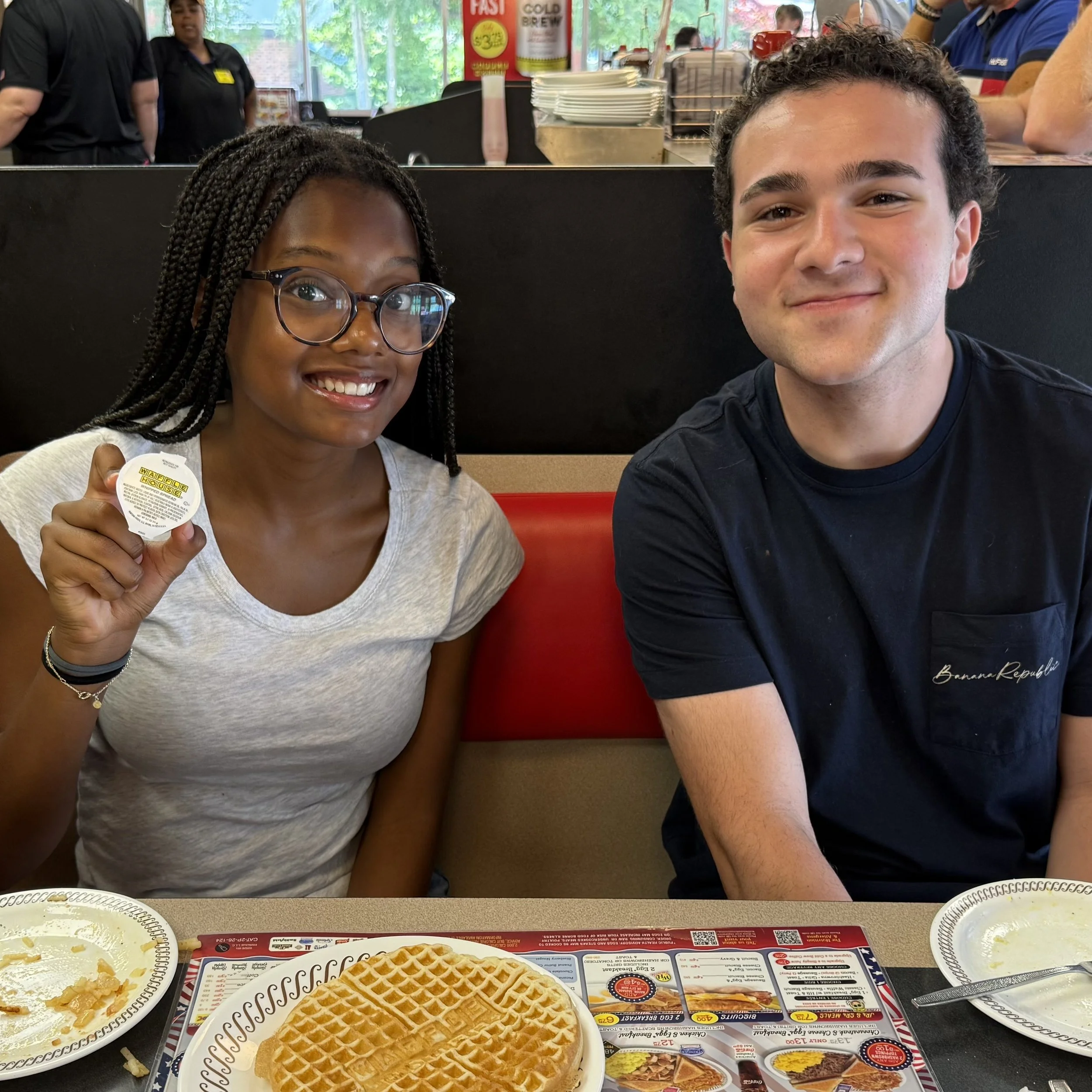 Enjoying the signature dish at Waffle House
