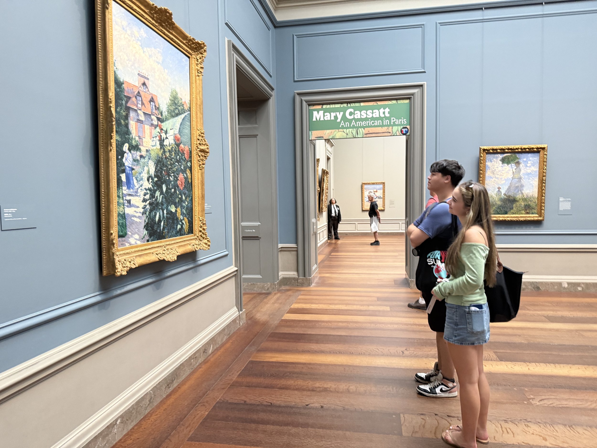 Taking in work at the National Gallery of Art