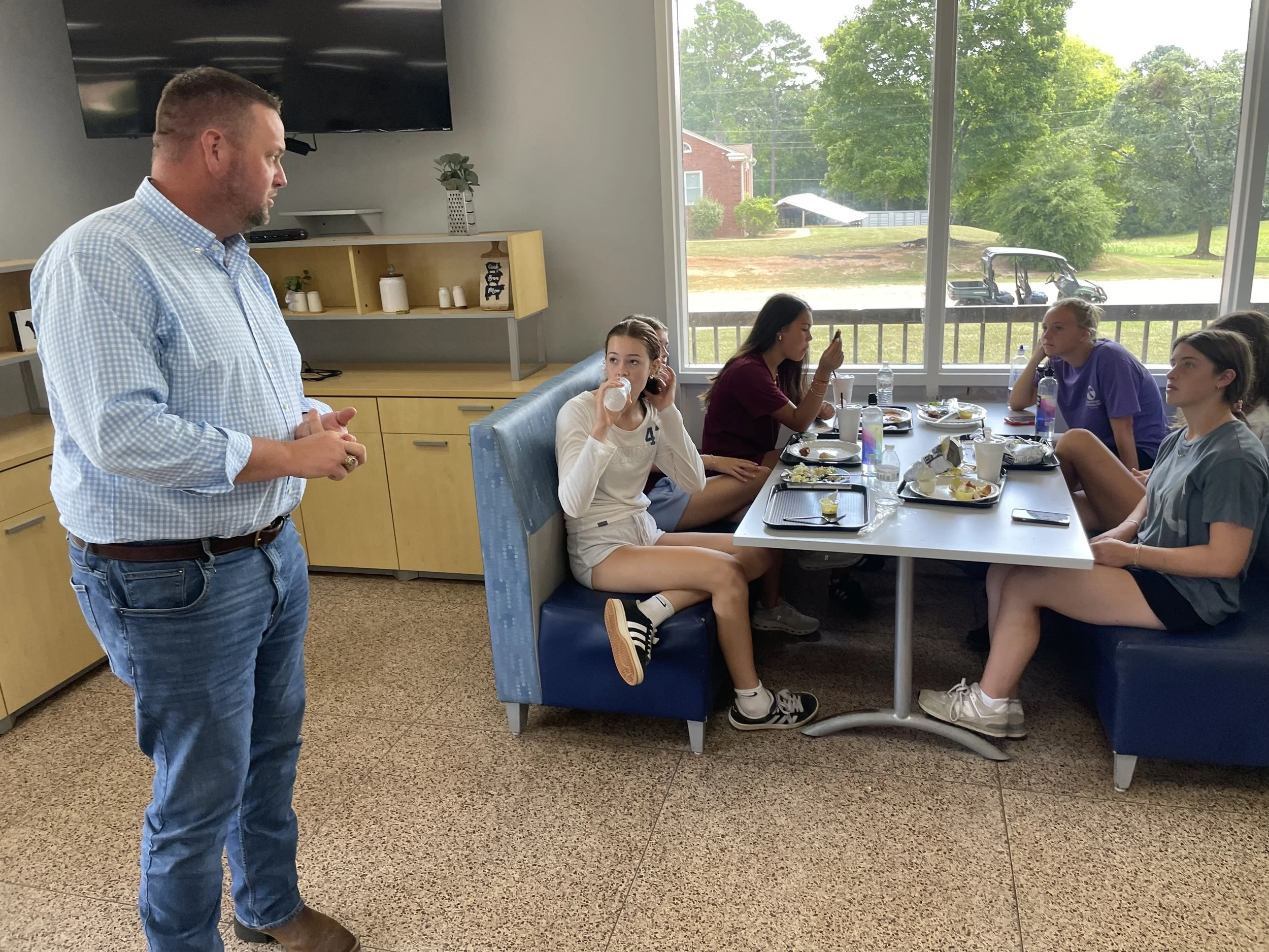 School President Dr. Tim Keown talks with our group
