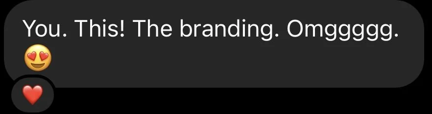 Screenshot of a text message conversation praising branding, with an emoji of a face with heart eyes and a red heart emoji.