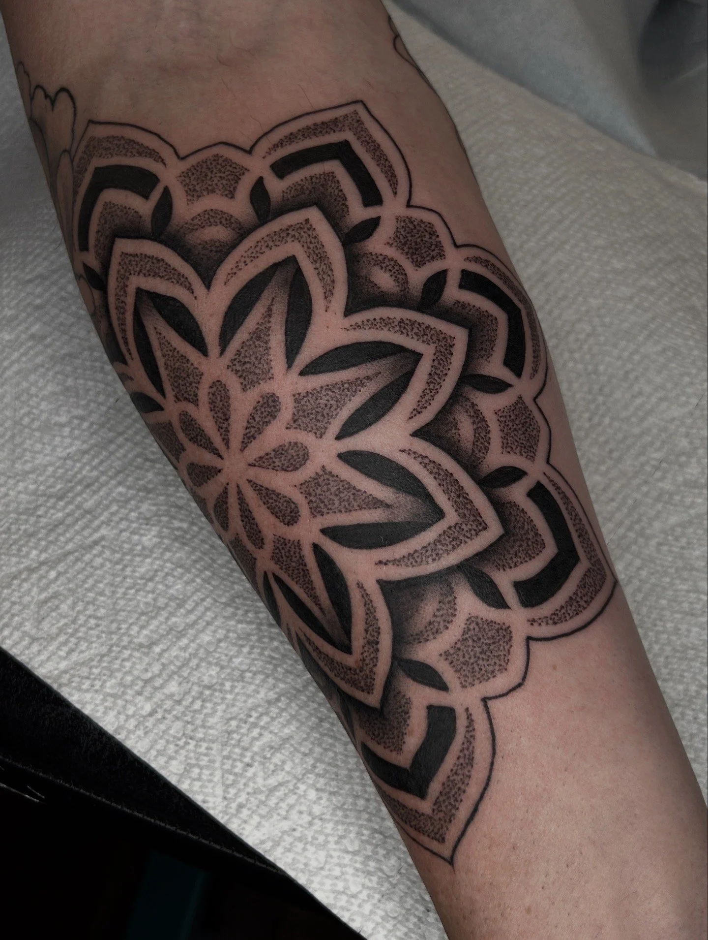 Geometric Mandala tattoo by Jordan Mitchell in Austin Texas