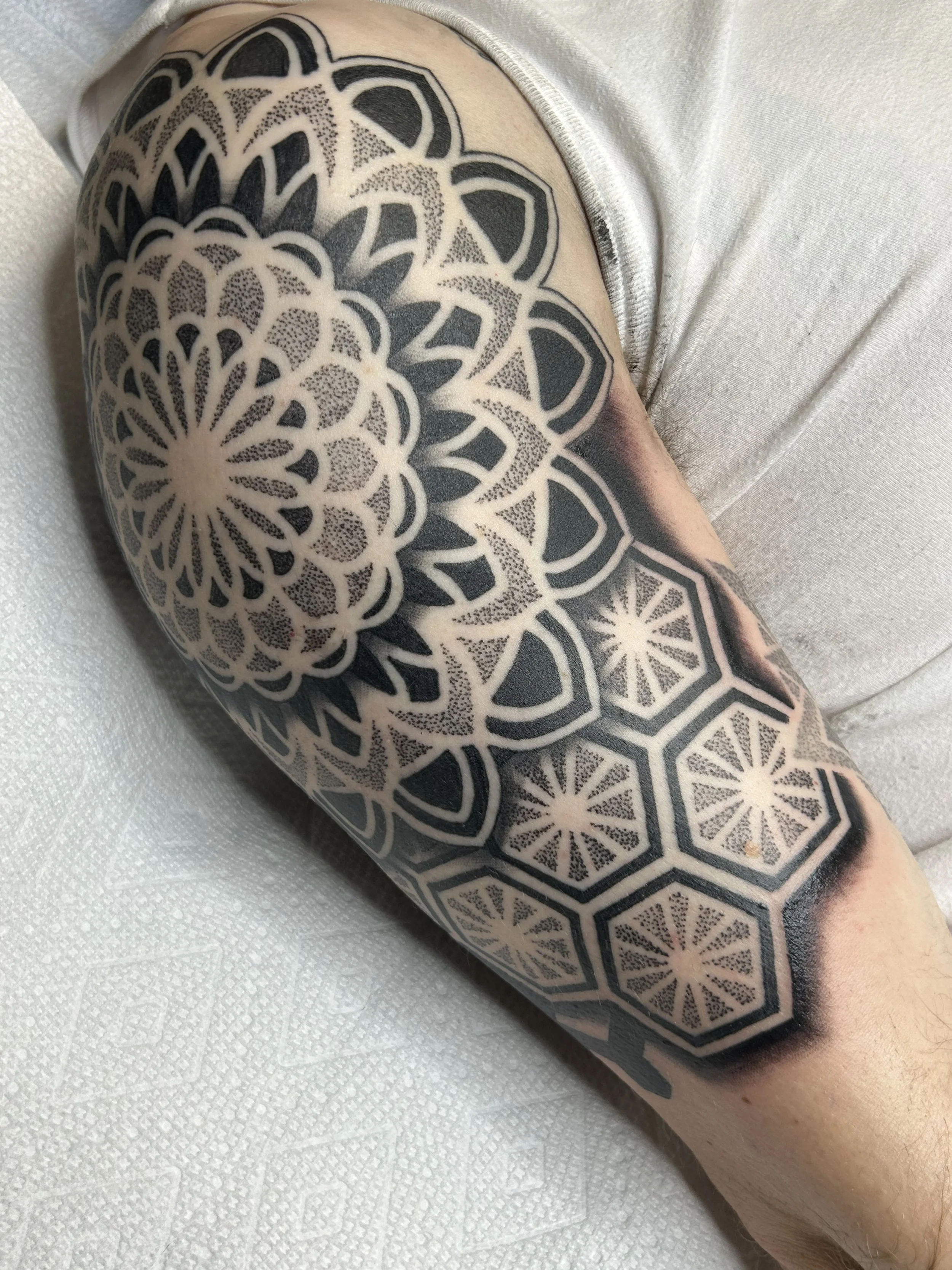 Geometric half sleeve healed 