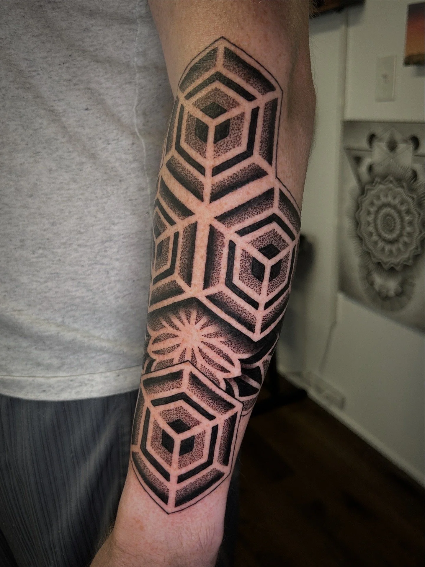 Geometric dot-work tattoo