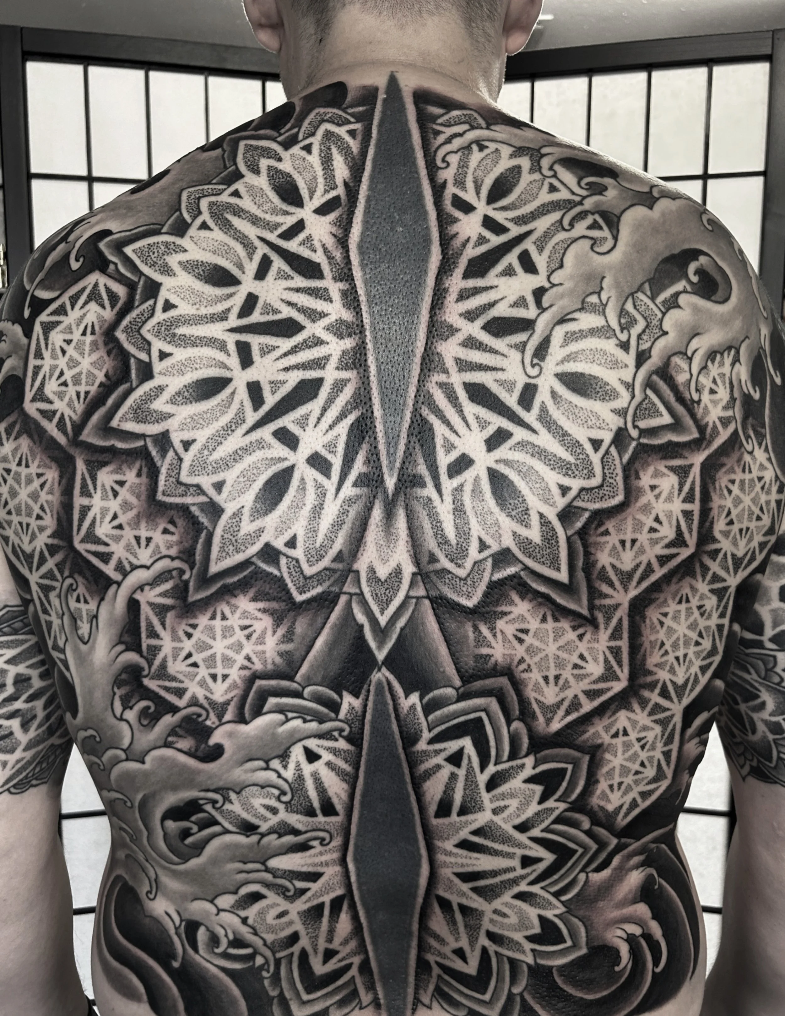 Geometric / Japanese style backpiece tattoo