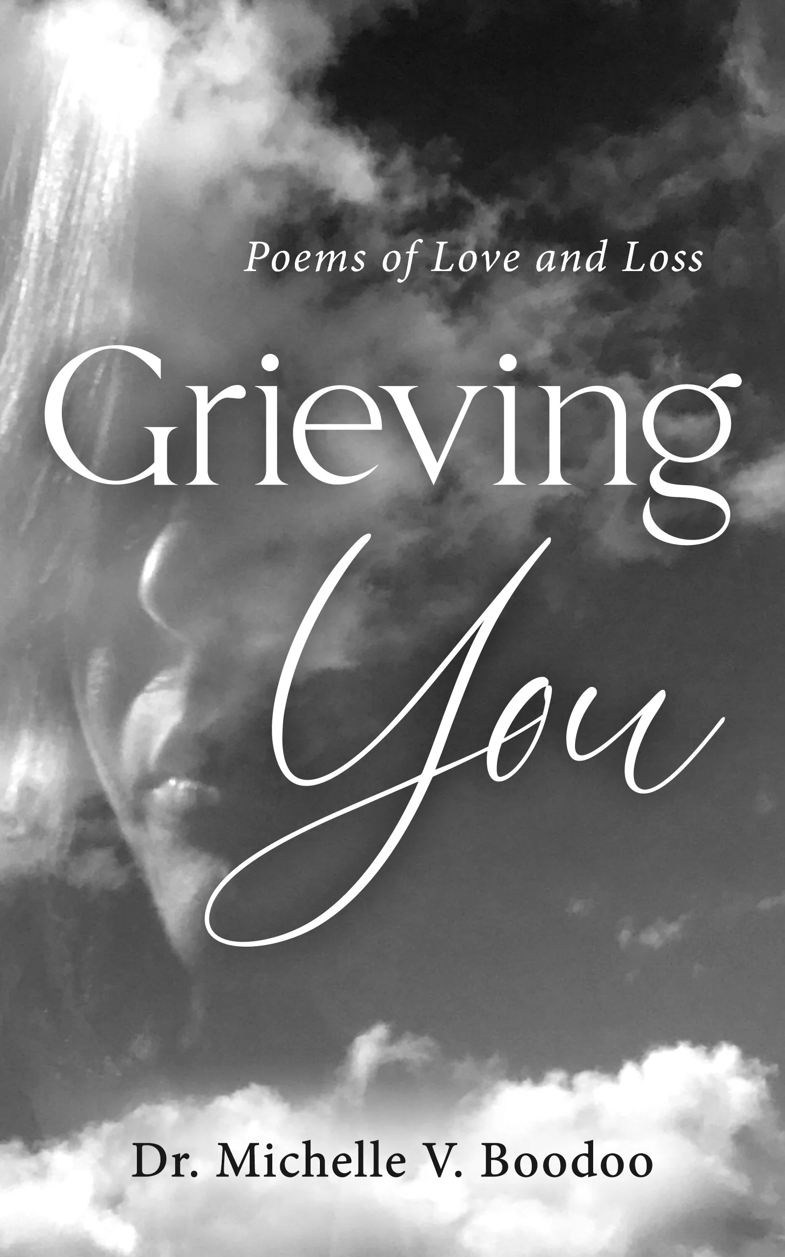 Book cover with a cloudy sky background features the title 'Grieving You' in large elegant white script, with the subtitle 'Poems of Love and Loss' in smaller print above, and author Dr. Michelle V. Boodoo's name at the bottom.