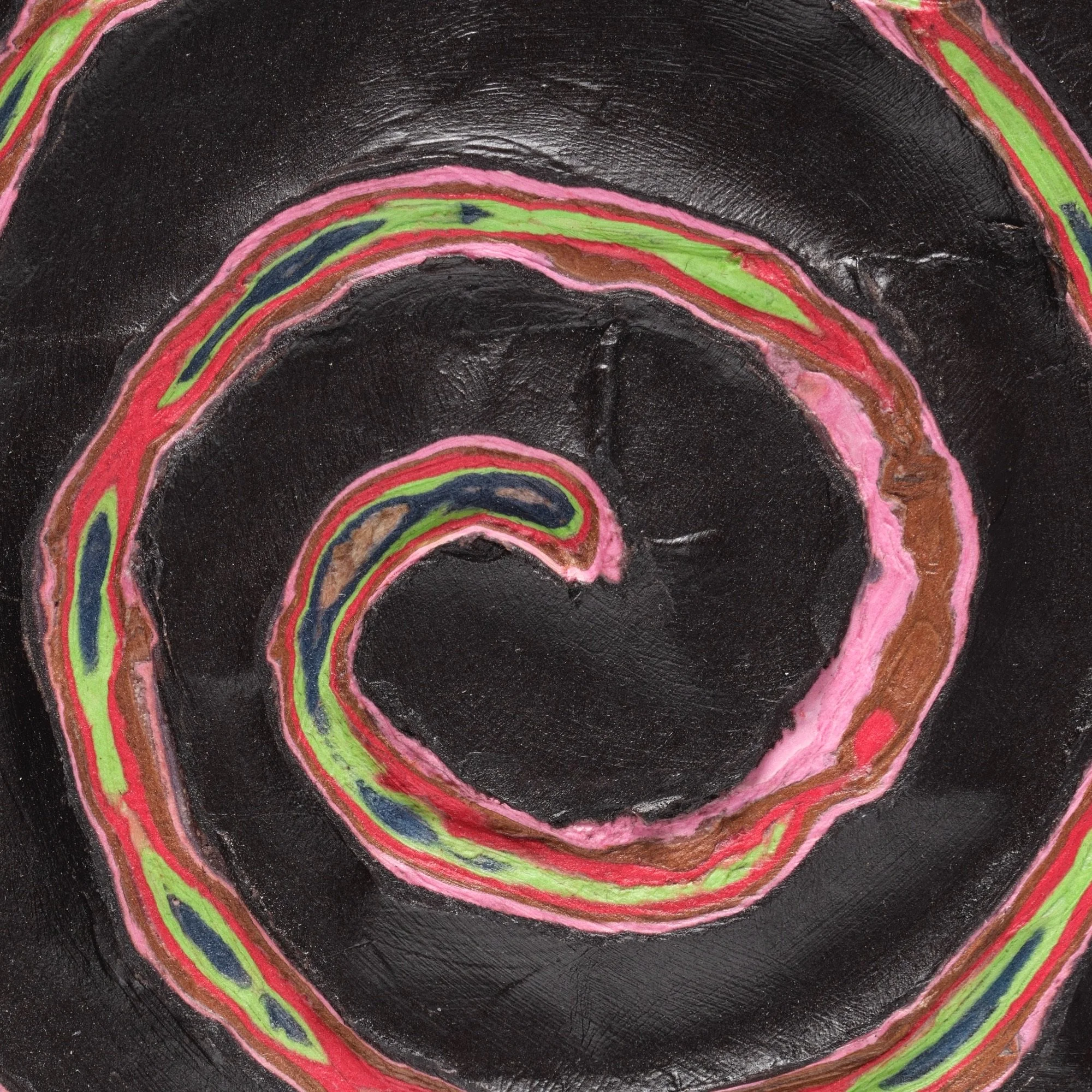 Surface detail of Black #5 with exposed layers and sculptural cuts