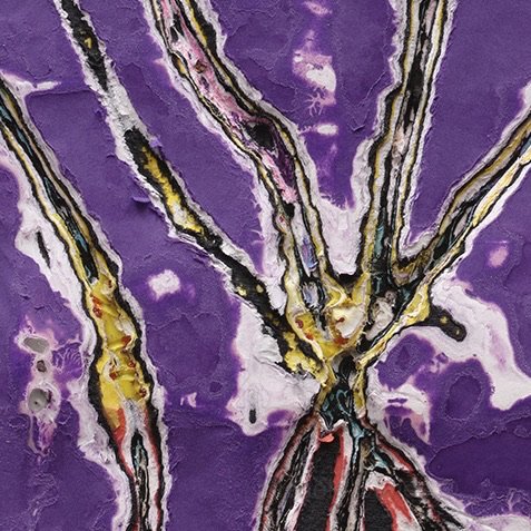 Surface detail of Noirka with exposed layers and sculptural cuts