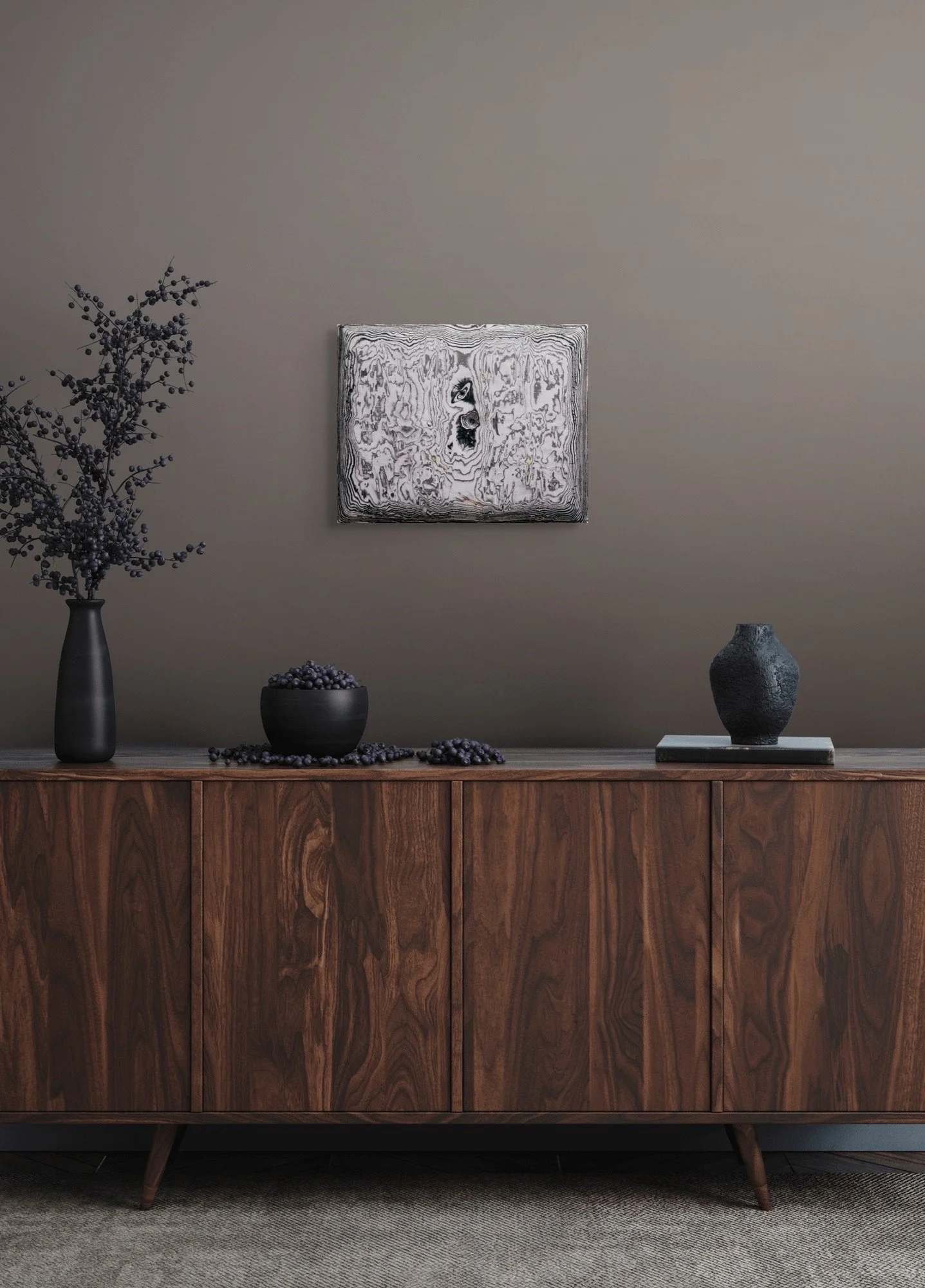 Ringed Aperture, layered and hand-carved paper artwork by Michele Bonds, shown in contemporary interior