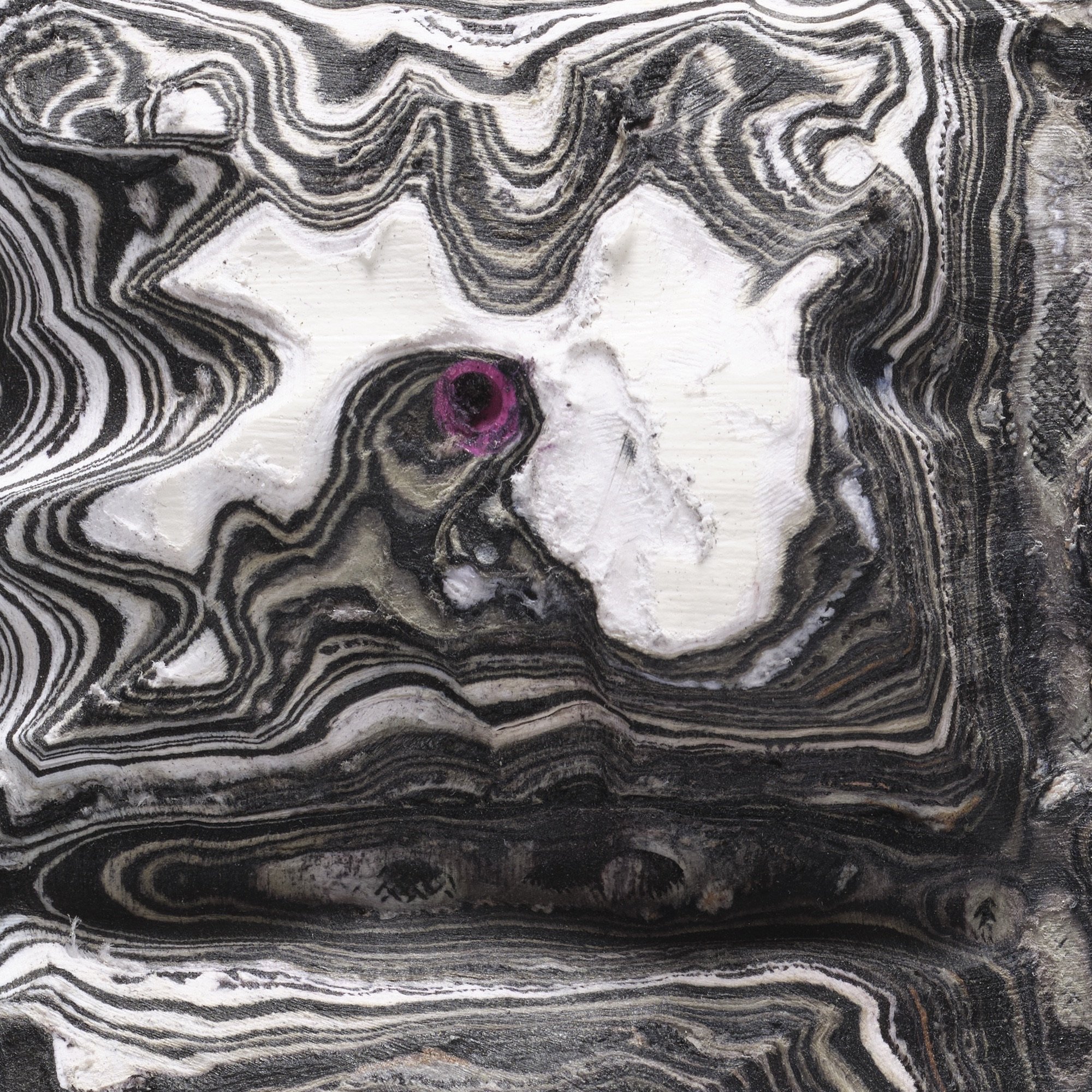 Macro detail of White #1 highlighting carved paper relief and internal structure